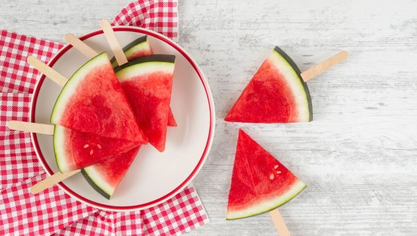watermelon slices on popsicle sticks